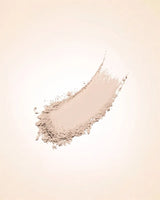 Smudged powder streak swatch demonstrating the fine texture and fair shade coverage of Swiss Miss Compact Powder in Light Ivory SM 01.