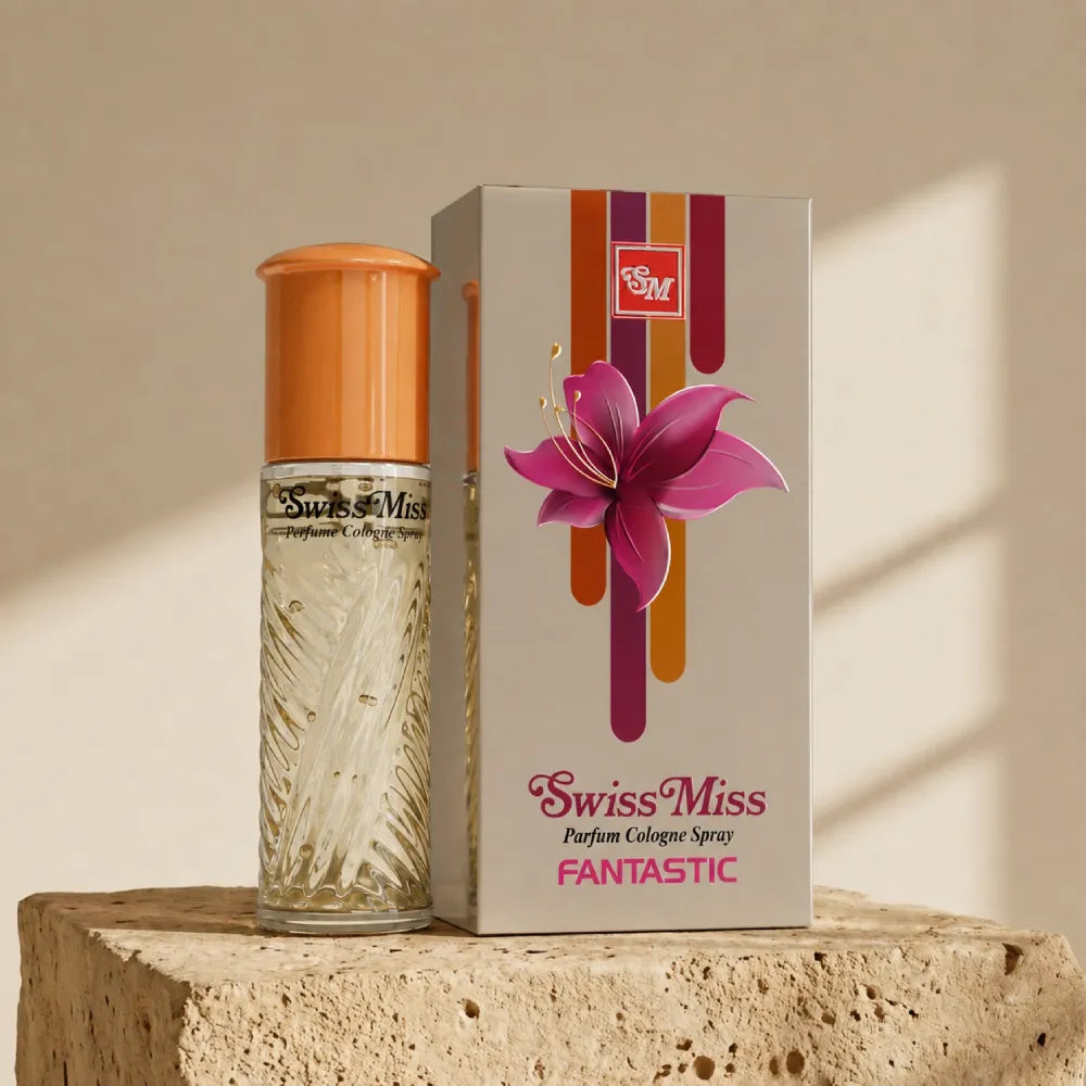 Swiss Miss Fantastic Perfume 15ml textured glass bottle with gold cap beside a grey floral packaging box on a stone pedestal